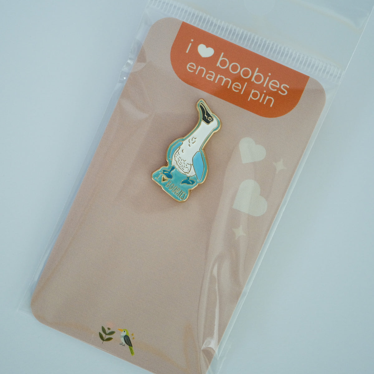 Blue-Footed Boobie Enamel Pin with Acorn & Artisan retail packaging