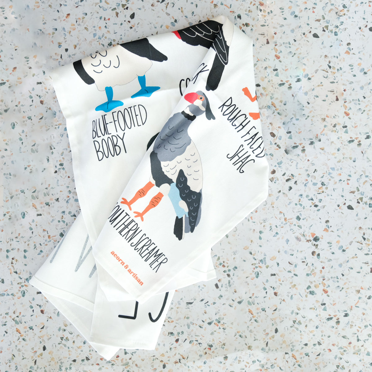 Fowl Language tea towel with illustrated birds and their names.