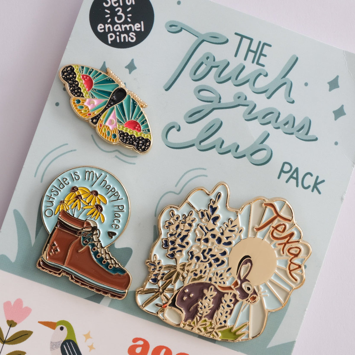 Touch Grass Club pin set with Cosmic Moth, Outside Is My Happy Place and Texas rabbit.
