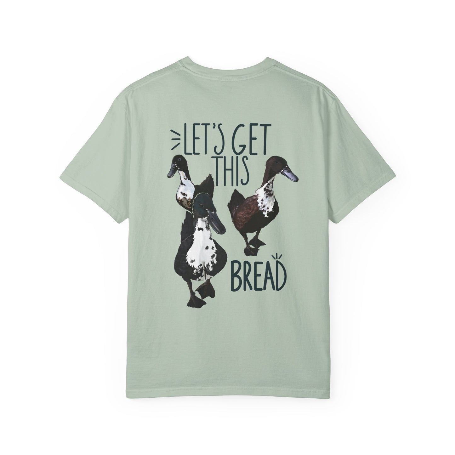 Light green t-shirt with duck graphic and text on a white background