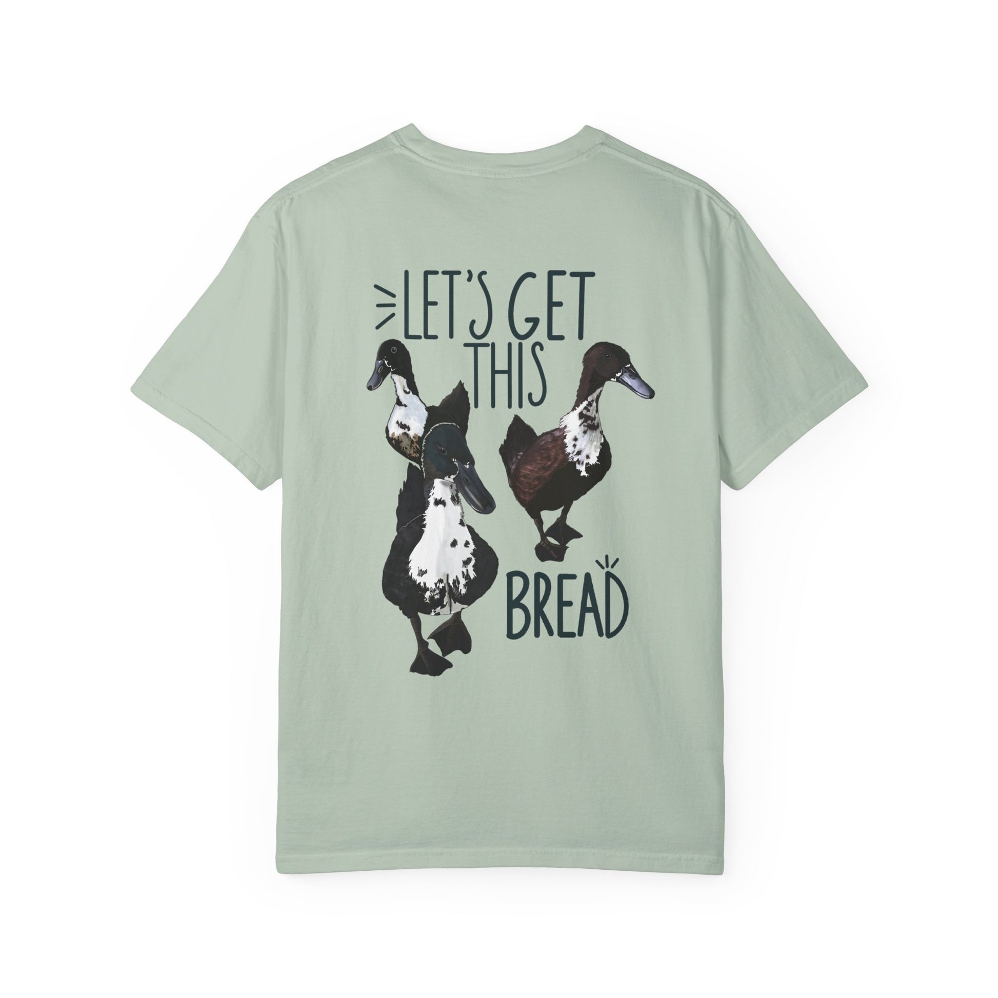 Light green t-shirt with duck graphic and text on a white background