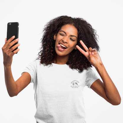 Woman taking a selfie with a peace sign on a white background