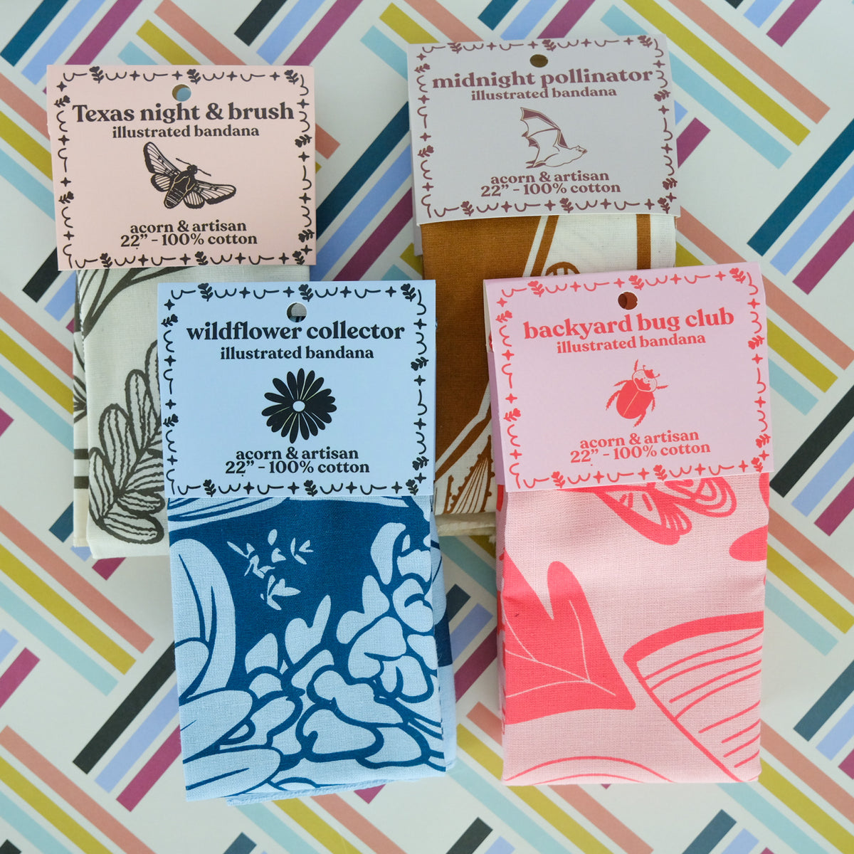 Assorted Acorn & Artisan illustrated cotton bandanas including the Wildflower Collector Floral Cotton Bandana