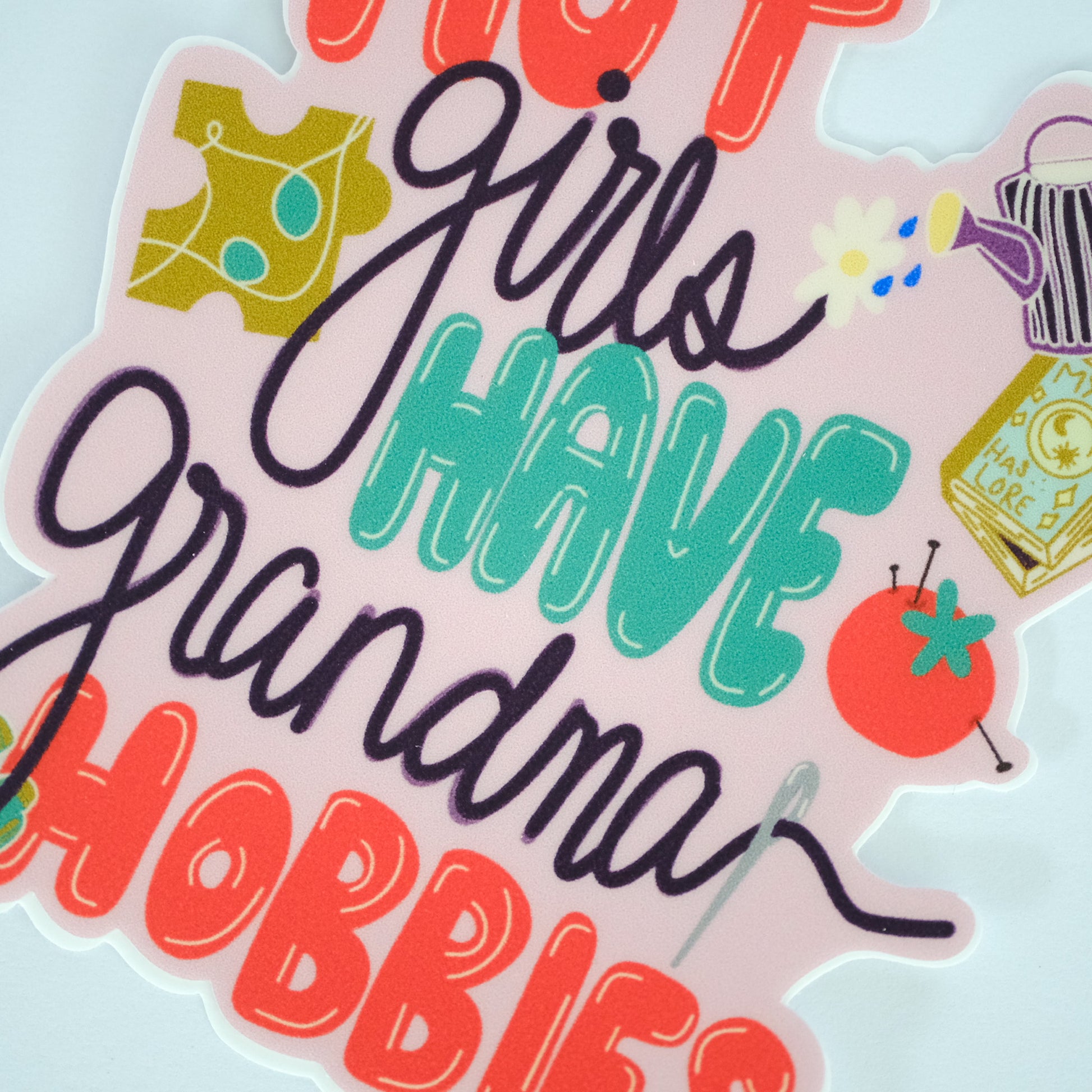 Close-up of Hot Girls Have Grandma Hobbies Vinyl Sticker, showing the illustrated design and product details