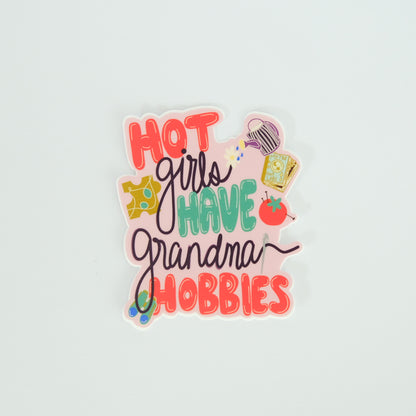 Hot Girls Have Grandma Hobbies Vinyl Sticker photographed on a white background