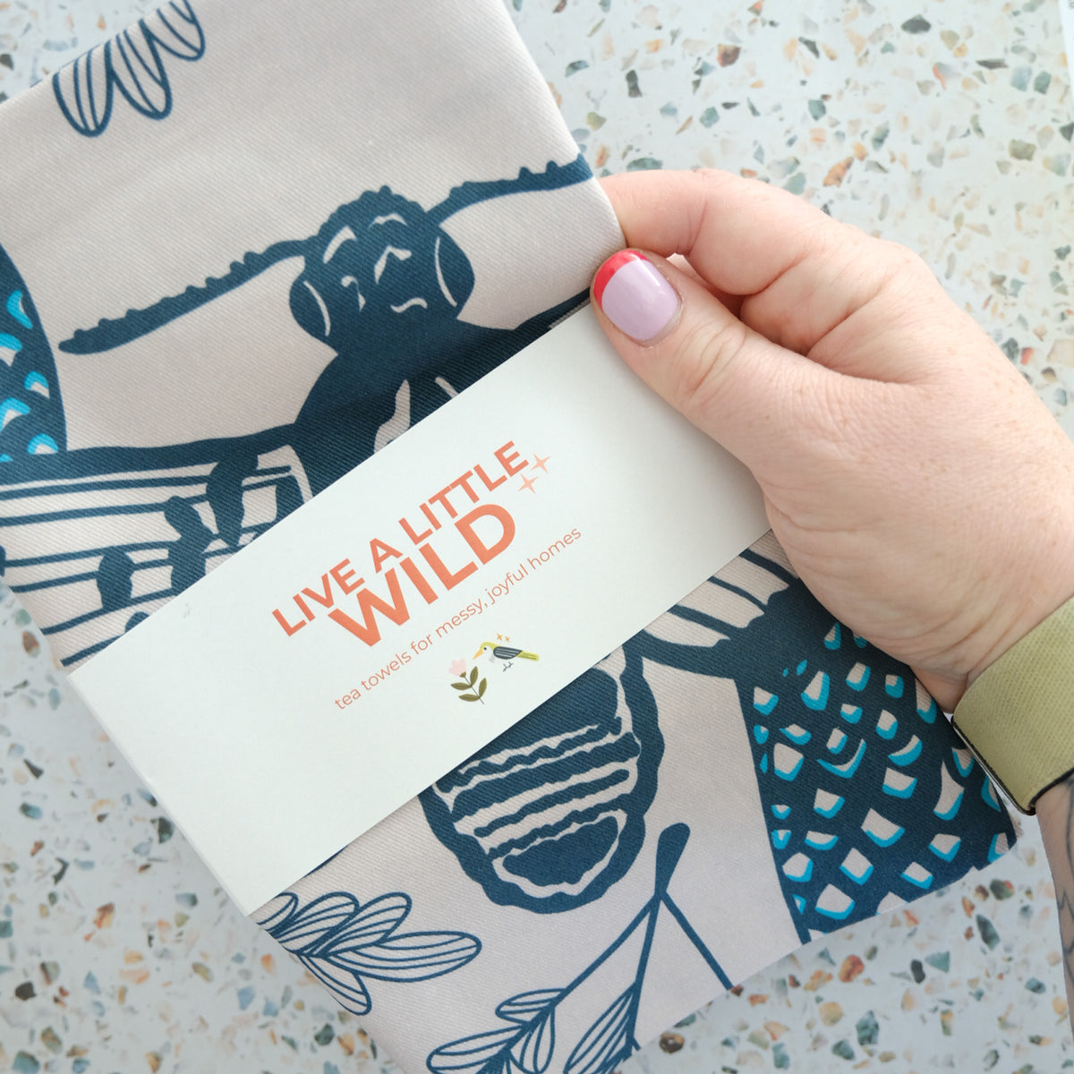 Texas Night & Brush Tea Towel styled in a colorful lifestyle setting