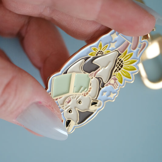 Reading Opossum Enamel Keychain