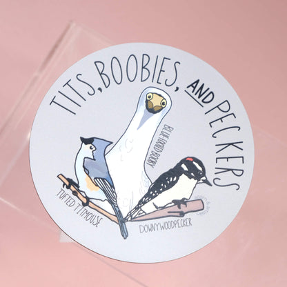 magnet showing a tufted titmouse, blue footed booby, and a downy woodpecker with the title tits, boobies, and peckers