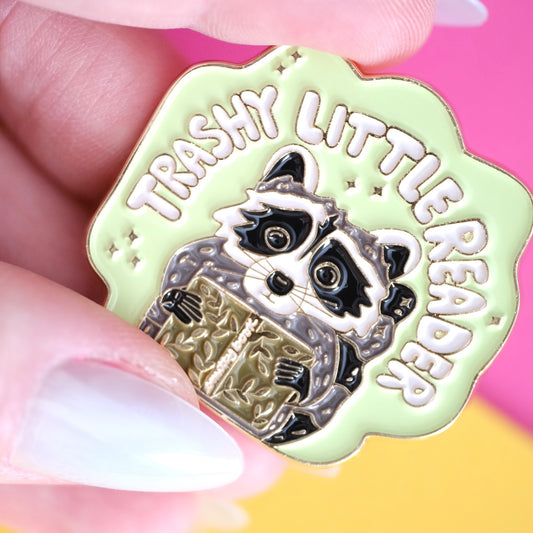 Trashy Little Reader Raccoon Enamel Pin