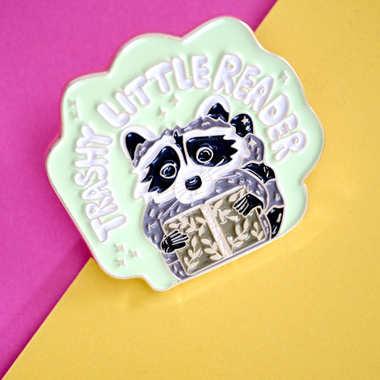 Trashy Little Reader Raccoon Enamel Pin